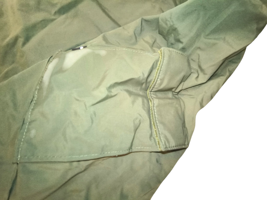 Awsum Thrift olive green water-resistant technical field jacket pocket detail with reinforced stitching