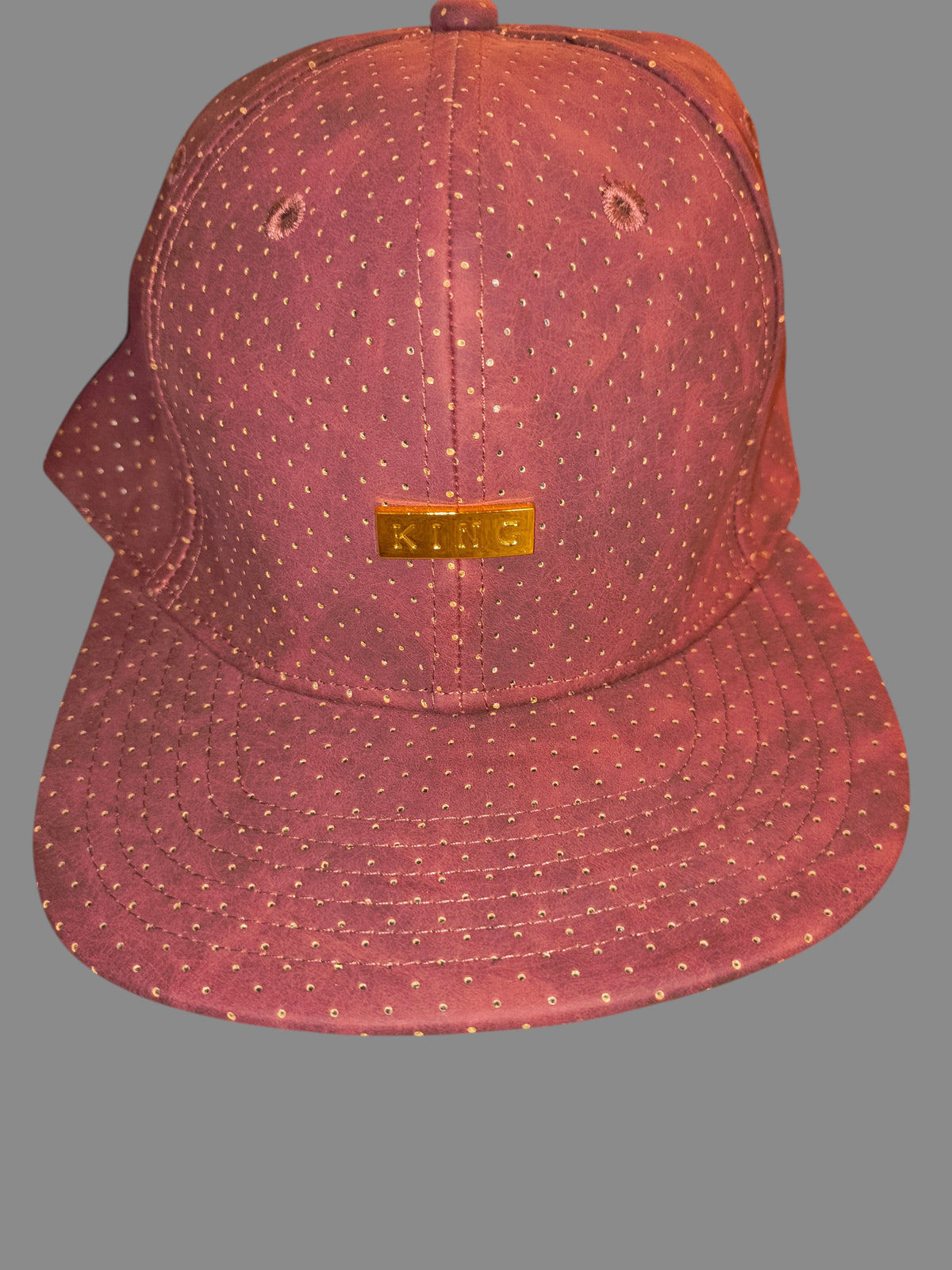 Awsum Thrift King Apparel maroon perforated faux-leather snapback hat with a polished gold metal logo plate