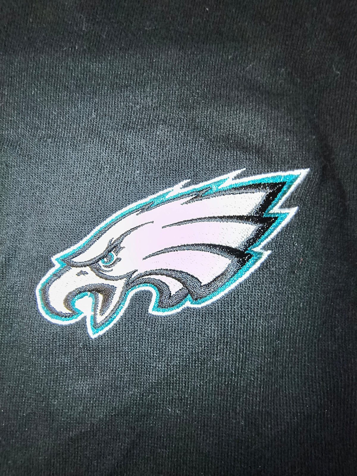 Awsum Thrift Philadelphia Eagles embroidered team logo patch in white, black, and teal on a white background