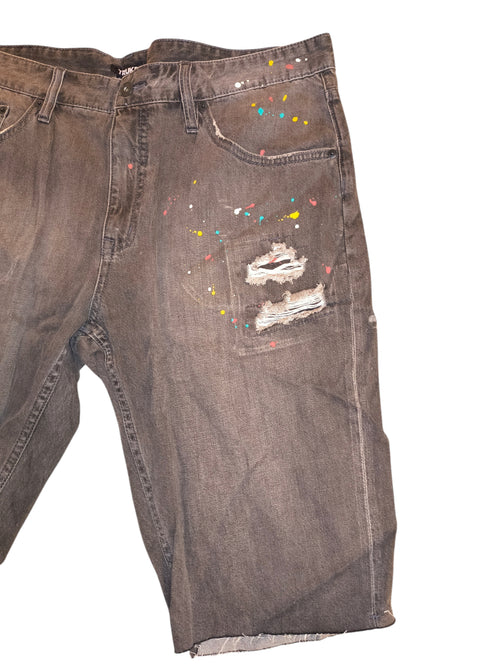 Awsum Thrift Truck Fit shorts in charcoal denim with distressed rips and colorful paint splatter details