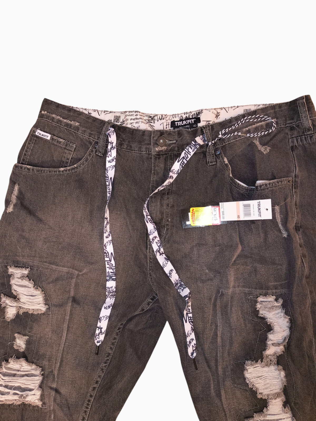 Awsum Thrift Trukfit charcoal grey distressed denim shorts with graphic drawstrings and cartoon waistband lining