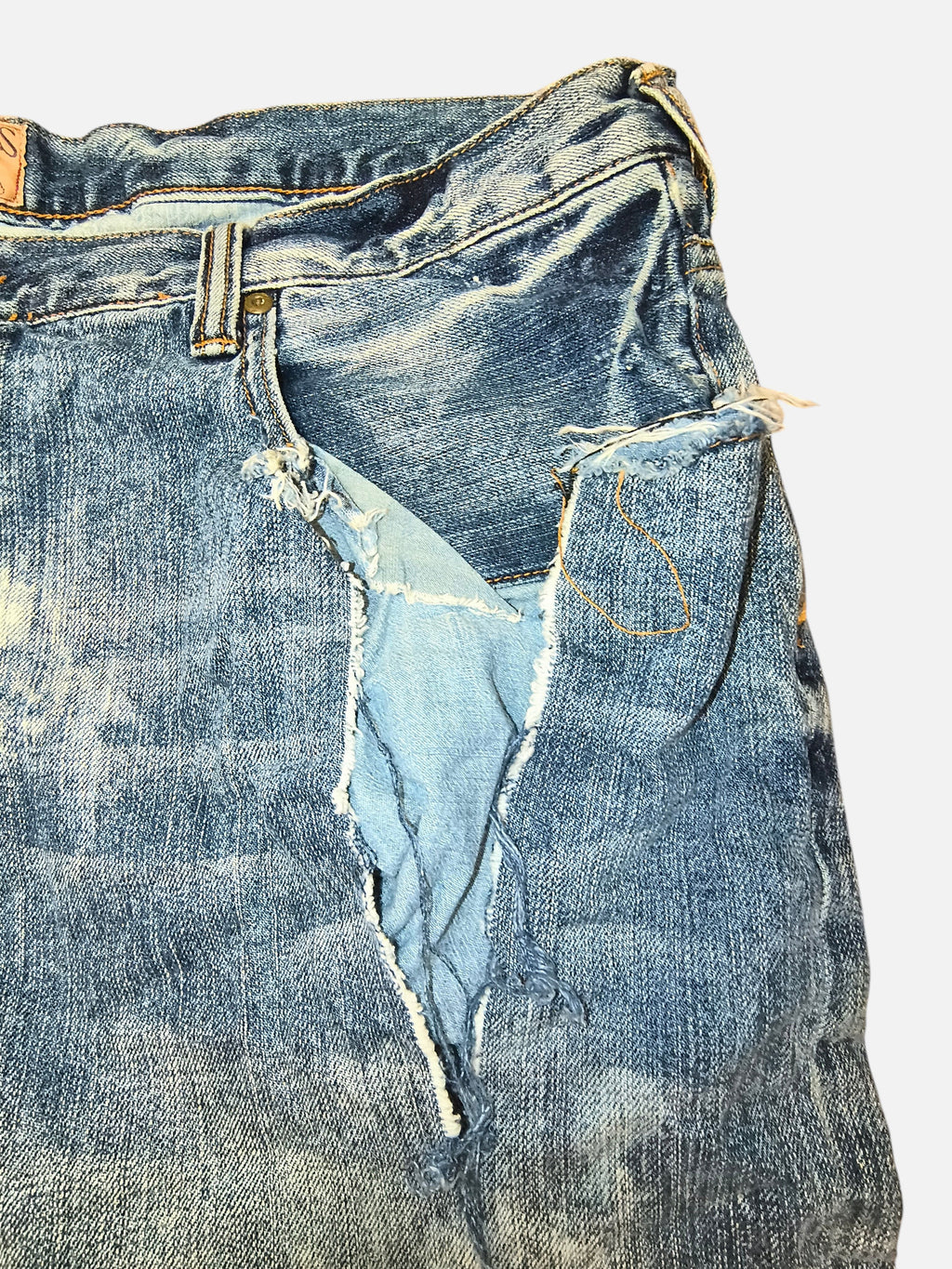 Awsum Thrift PRPS denim shorts featuring a distressed, ripped design with light blue fading and frayed edges.