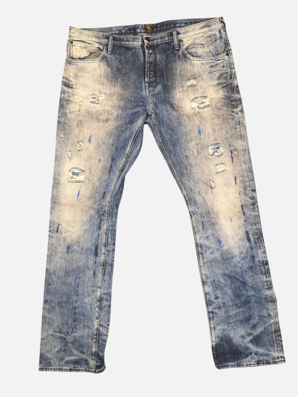 Awsum Thrift PRPS jeans in light blue denim with distressed rips and blue paint splatter details