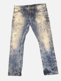 Awsum Thrift PRPS jeans in light blue denim with distressed rips and blue paint splatter details