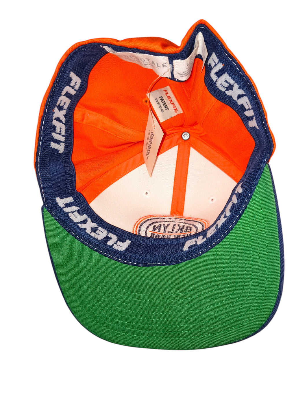 Awsum Thrift Aéropostale Flexfit hat interior showing orange crown, green under-brim, and branded stretch-band lining.