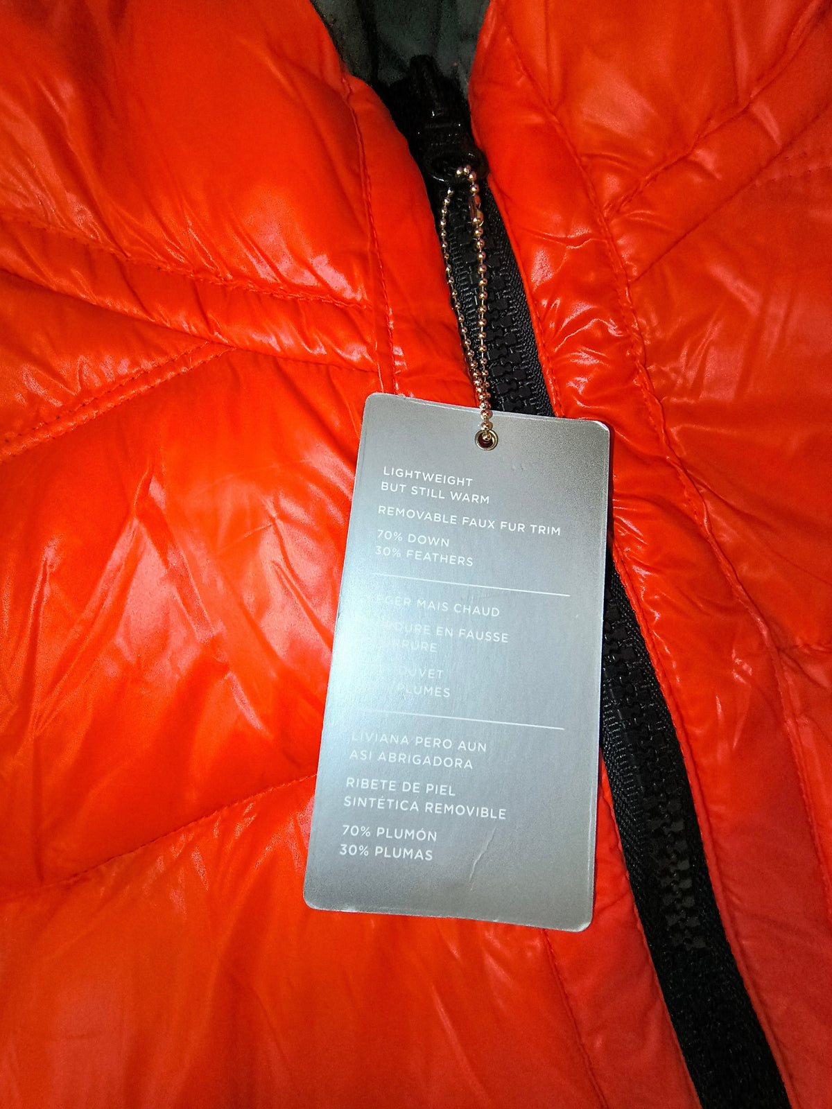 Awsum Thrift American Eagle Outfitters jacket retail tag showing down and feather fill details