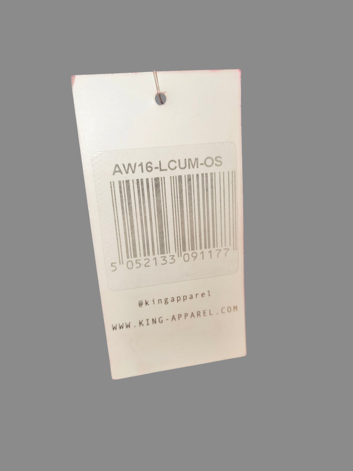 Awsum Thrift King Apparel product tag with barcode and style number AW16-LCUM-OS for a premium dad hat