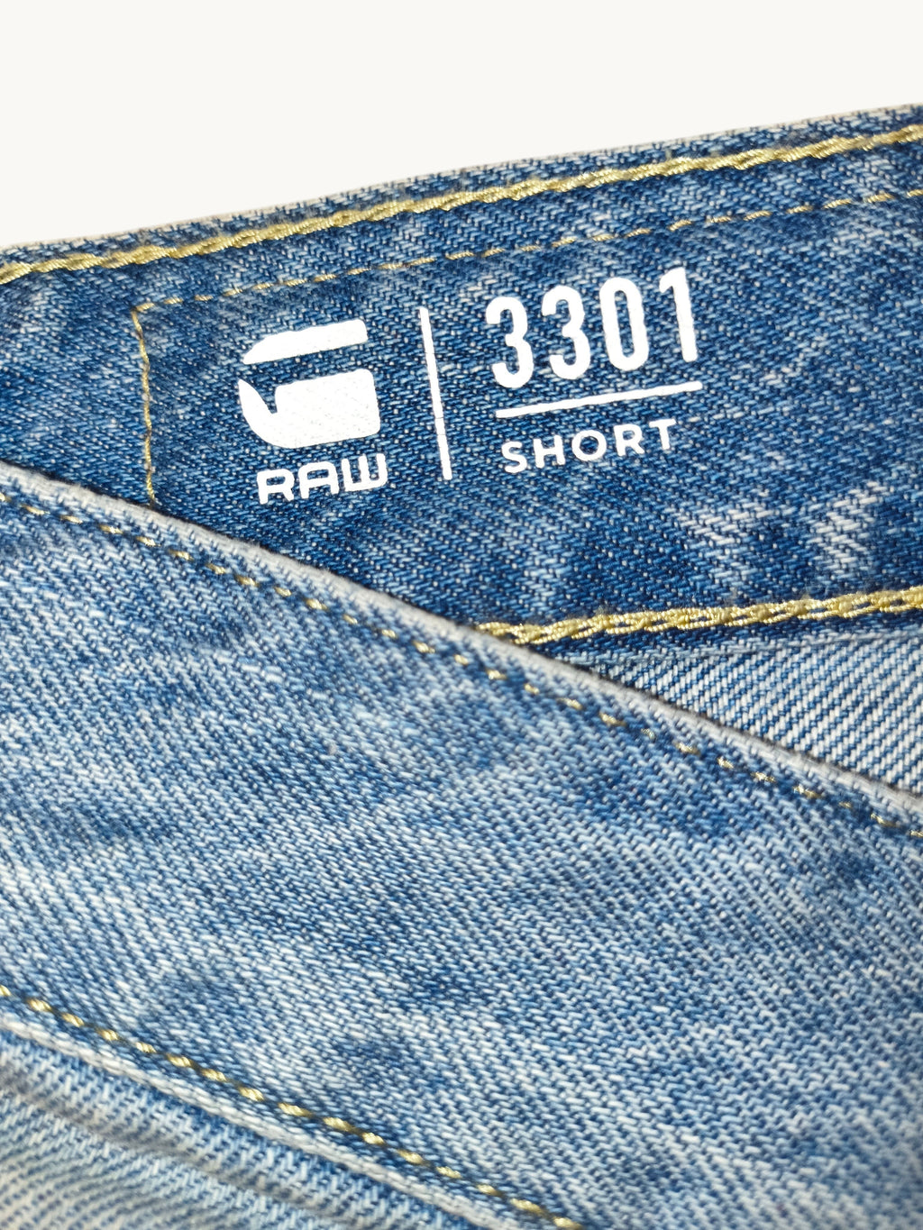 Awsum Thrift G-Raw 3301 blue denim jean shorts with yellow contrast stitching and branded interior label