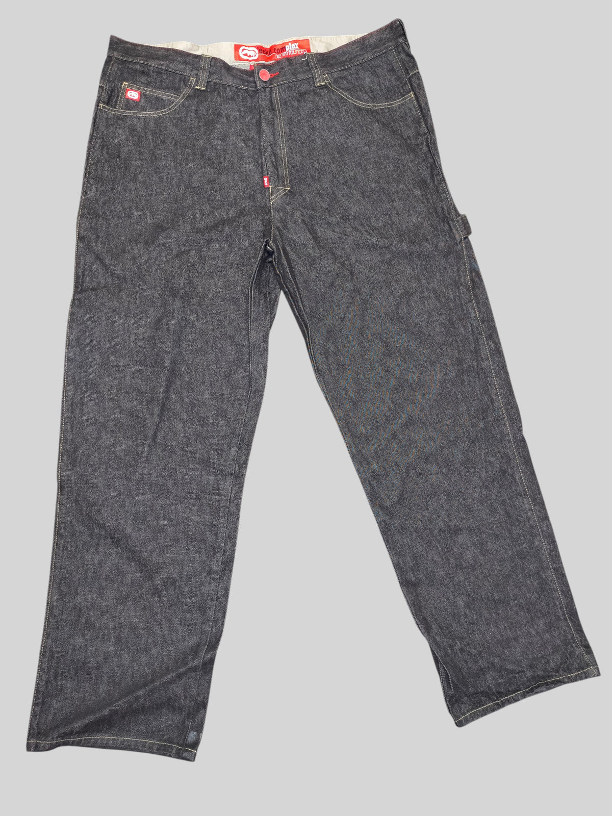 Awsum Thrift Ecko dark grey denim carpenter pants with contrast stitching and branded waist label