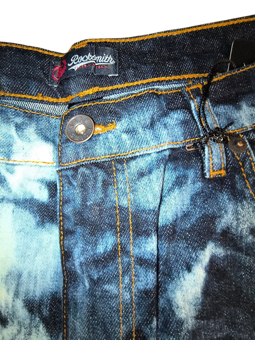 Awsum Thrift Rocksmith NYC tie-dye bleached indigo jeans with contrast orange stitching and branded metal button.