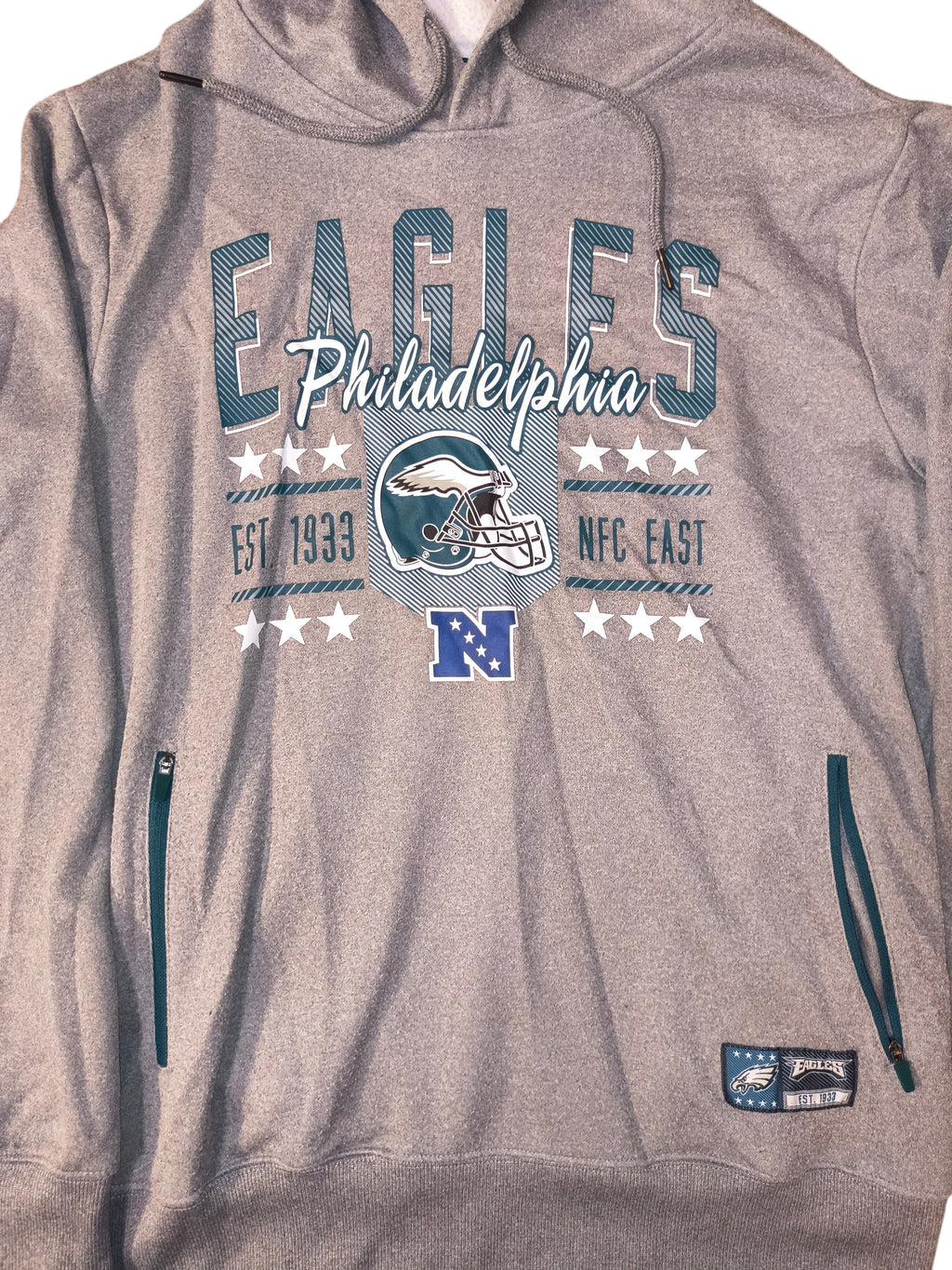 Awsum Thrift heather gray Philadelphia Eagles fleece hoodie with graphic print, teal zippered pockets, and team patch.