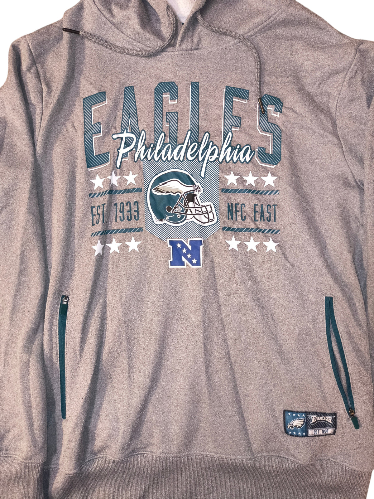 Awsum Thrift heather gray Philadelphia Eagles fleece hoodie with graphic print, teal zippered pockets, and team patch.
