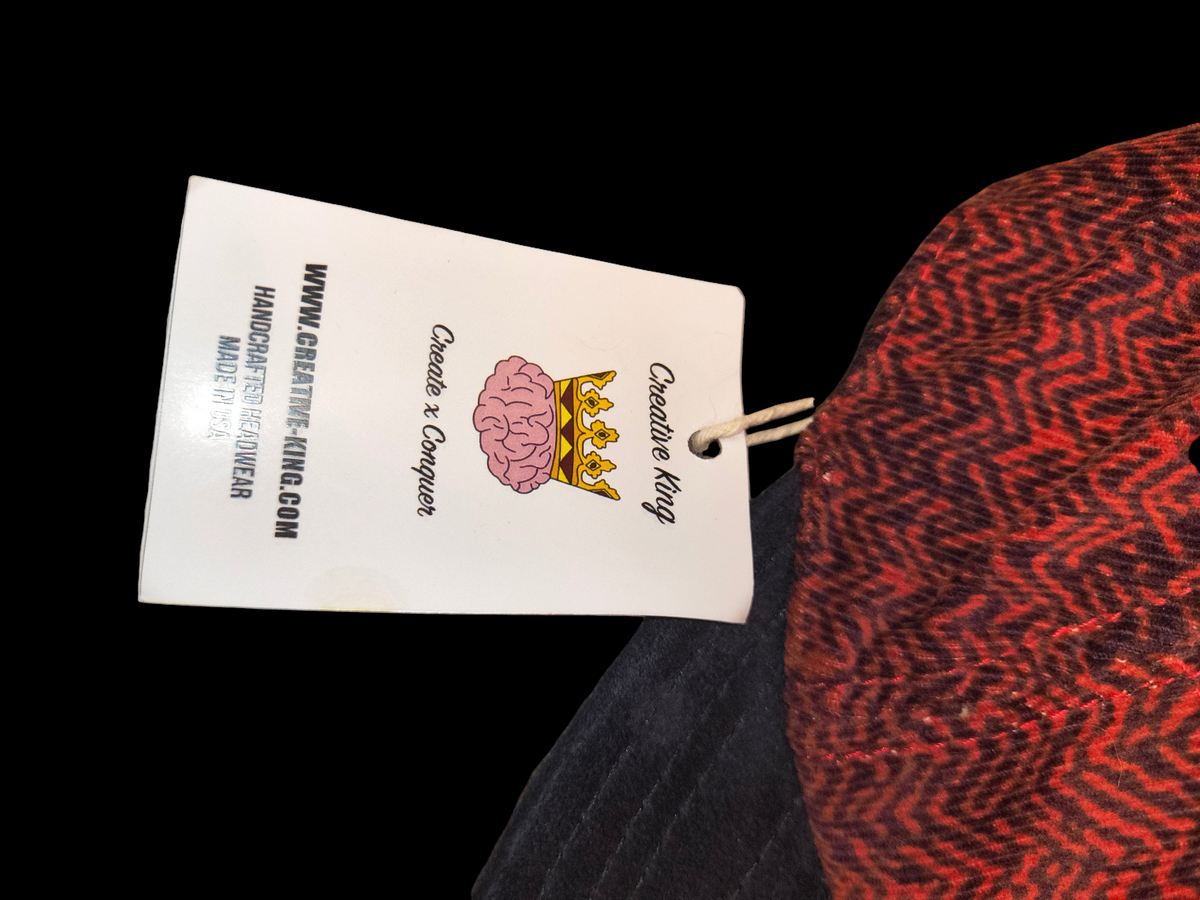 Awsum Thrift Creative King Hat Co. 5-panel camper hat with red and black chevron pattern and black brim with tag