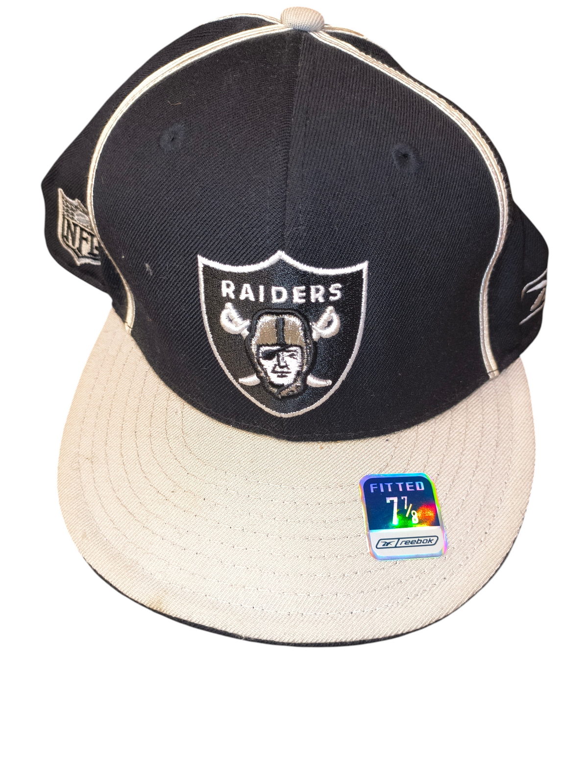 Awsum Thrift vintage Reebok Raiders fitted hat in black and grey with embroidered team logo and visor sticker