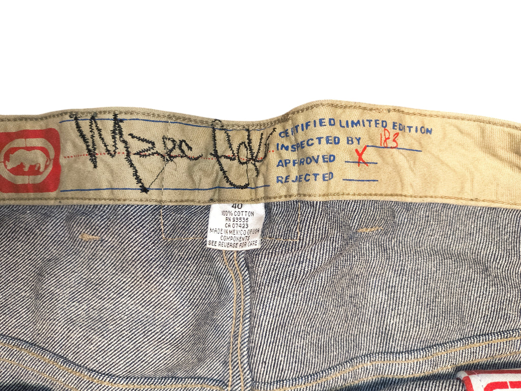 Awsum Thrift Ecko denim shorts featuring a tan waistband with embroidered logo and limited edition inspection details