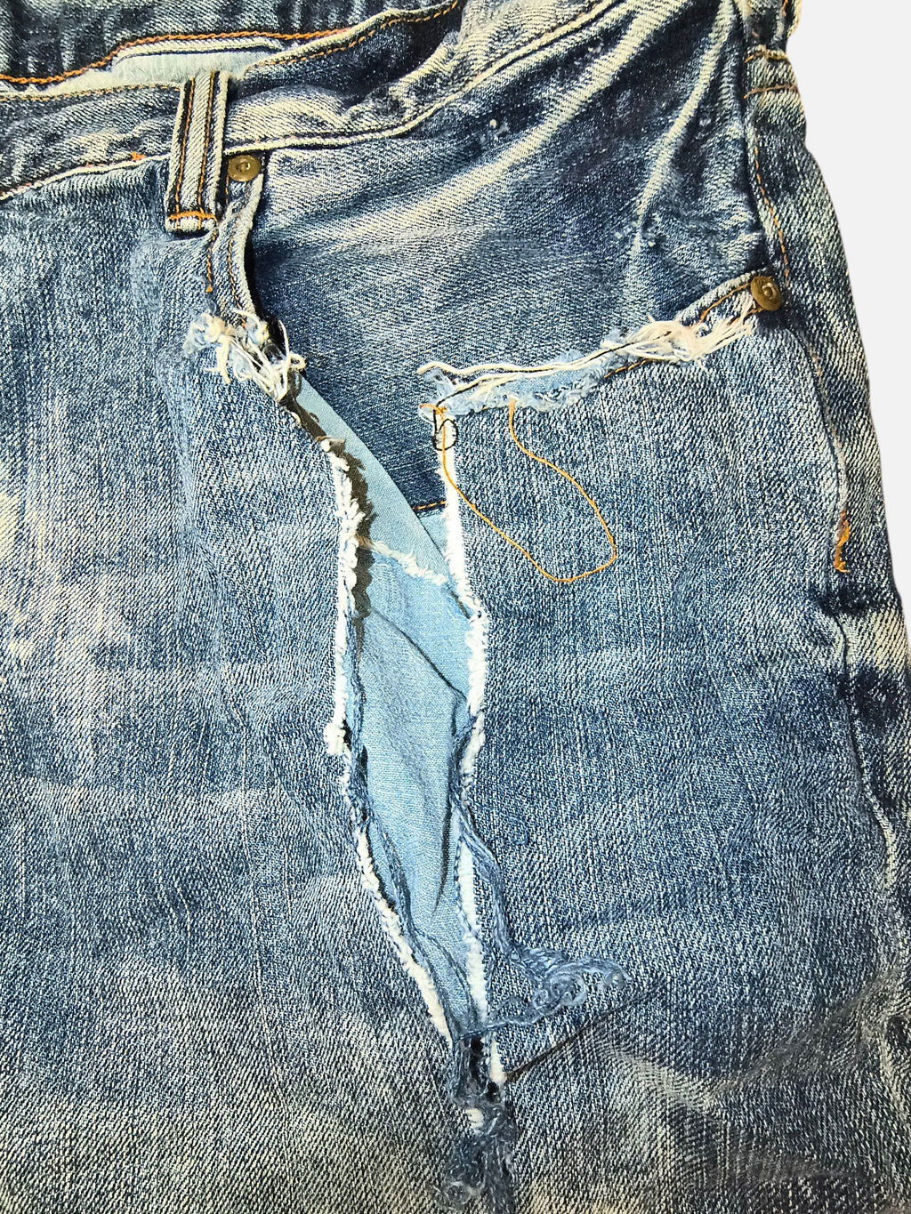 Awsum Thrift PRPS denim shorts featuring a distressed, ripped design with frayed edges and a faded blue wash.