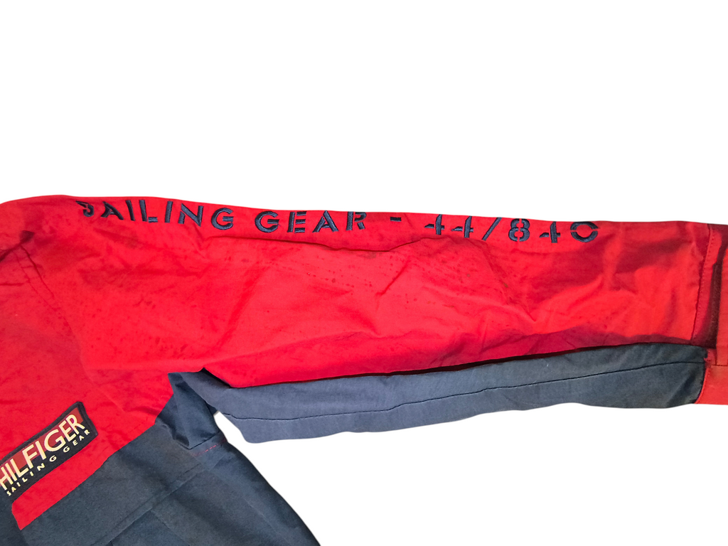 Awsum Thrift vintage Tommy Hilfiger sailing jacket sleeve in red and navy blue with embroidered sailing gear text