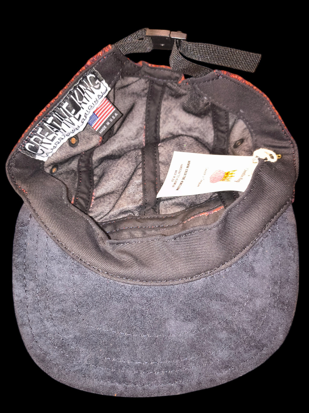 Awsum Thrift Creative King Hat Co. 5-panel camper hat interior view showing brand labels and black brim