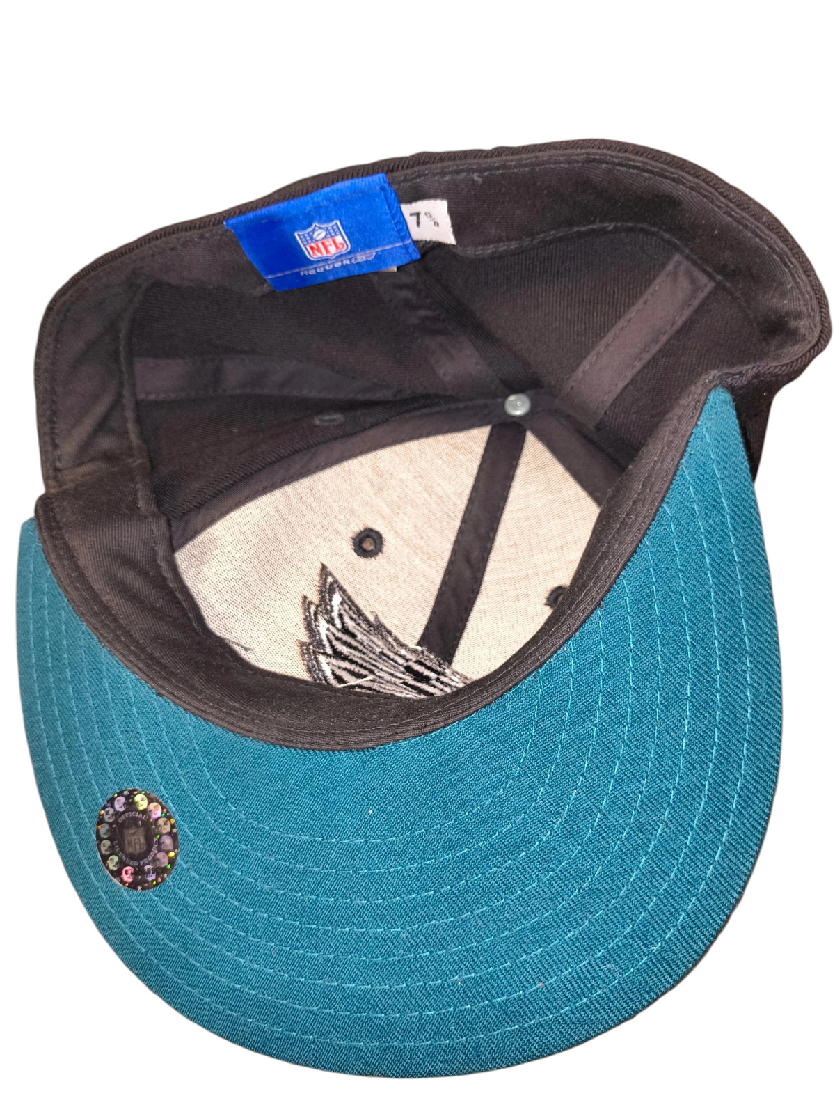 Awsum Thrift vintage Reebok Philadelphia Eagles fitted hat interior view showing NFL tag and teal under-brim
