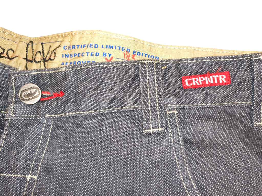 Awsum Thrift Ecko Jeans featuring a dark denim fabric, CRPNTR patch, and a certified limited edition inner waistband.