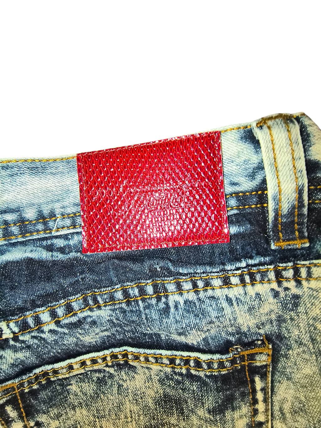 Awsum Thrift Scout Denim acid dark blue jeans featuring a textured red snakeskin faux leather back waistband patch.