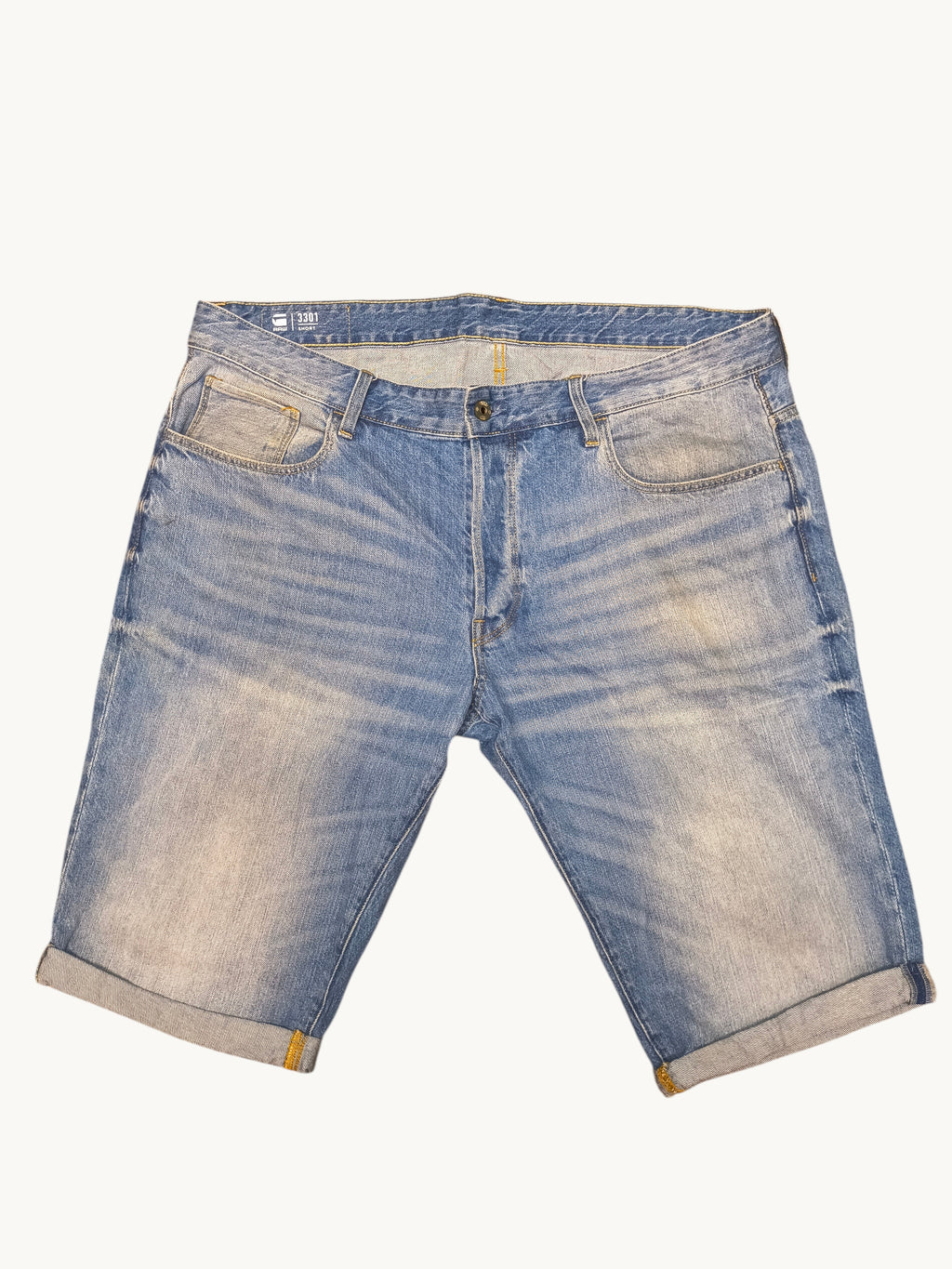 Awsum Thrift G-Raw blue denim jean shorts with a faded wash, five-pocket styling, and cuffed hems.
