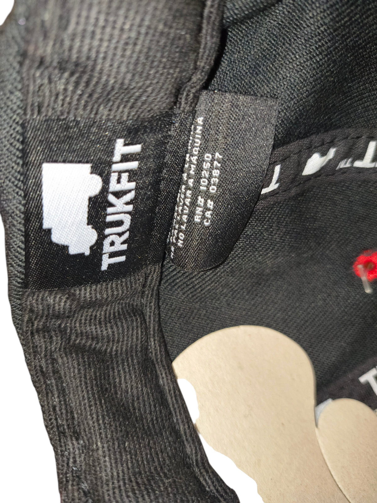 Awsum Thrift Trukfit snapback hat interior showing brand logo label and care tag
