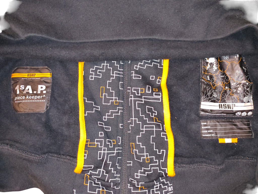 Awsum Thrift vintage Akademiks fleece jacket interior with pixelated maze pattern, ASMP patches, and ID label.