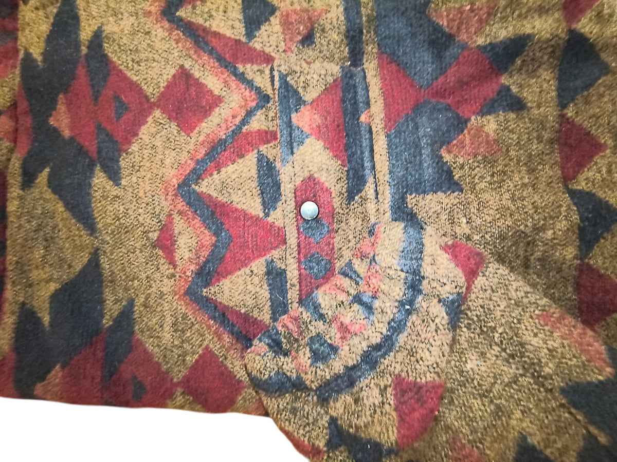 Awsum Thrift All Good fleece shirt jacket featuring a brown, burgundy, navy, and teal Aztec geometric pattern.