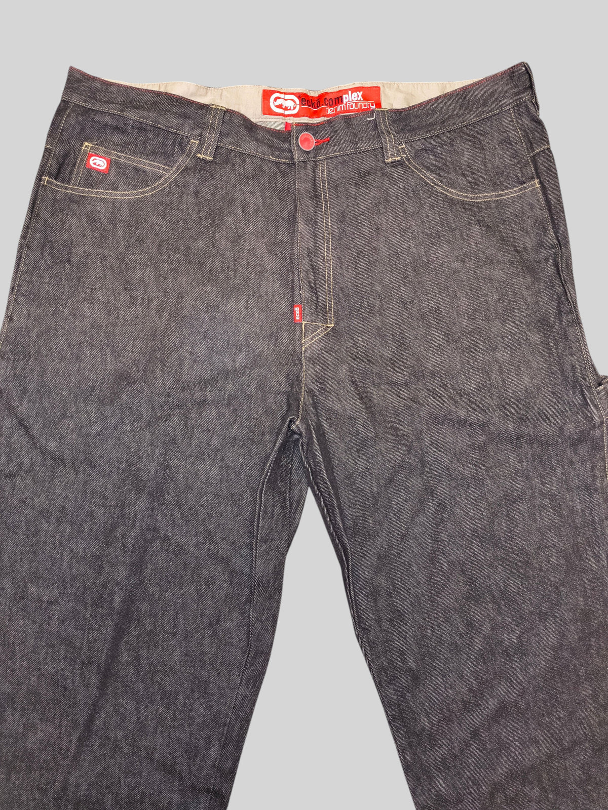 Awsum Thrift Ecko carpenter jeans in dark wash denim with contrast stitching and red logo detailing