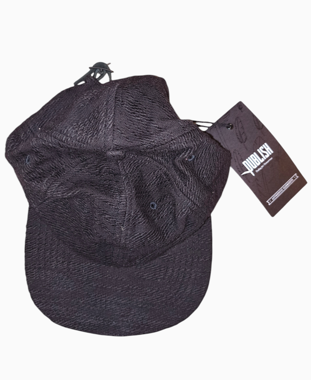 Awsum Thrift Publish Brand Davin black textured 5-panel camper hat with flat brim and original retail tags attached