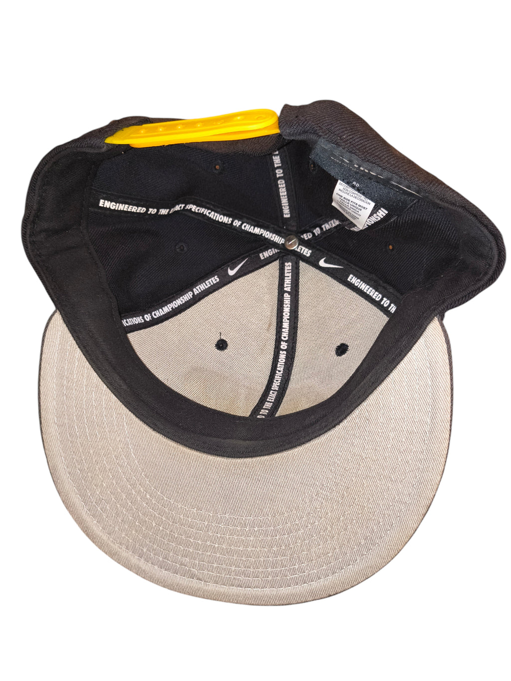 Awsum Thrift vintage Nike Air snapback hat interior view showing branded taping and yellow plastic closure