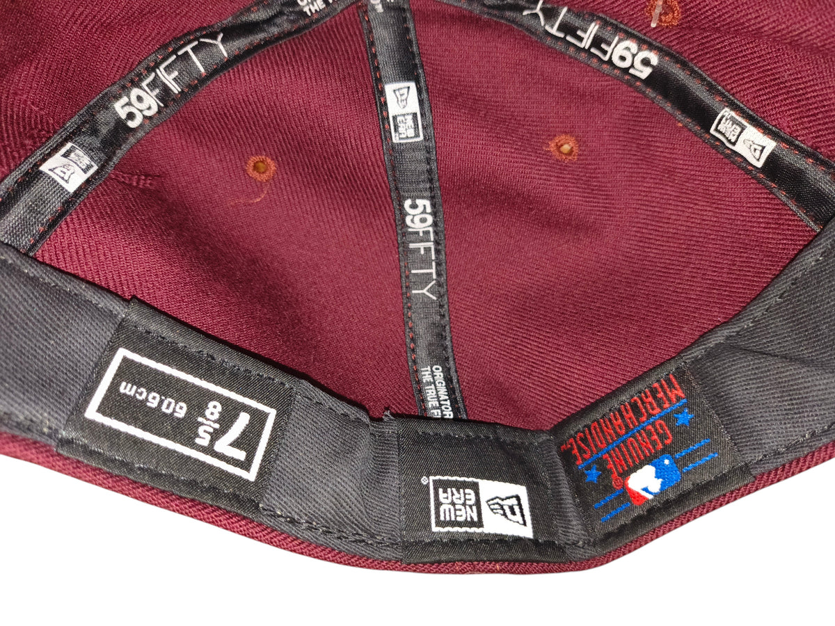 Interior of a maroon Awsum Thrift NY Hat showing 59FIFTY branding on the inner seams and a size 7 5/8 label.