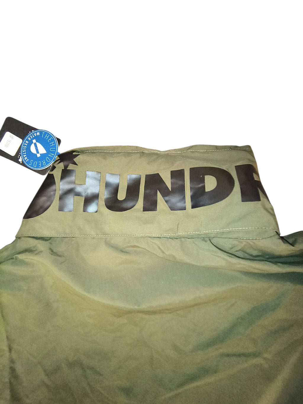Awsum Thrift The Hundreds olive green water-resistant field jacket collar with black matte logo detail and retail tag