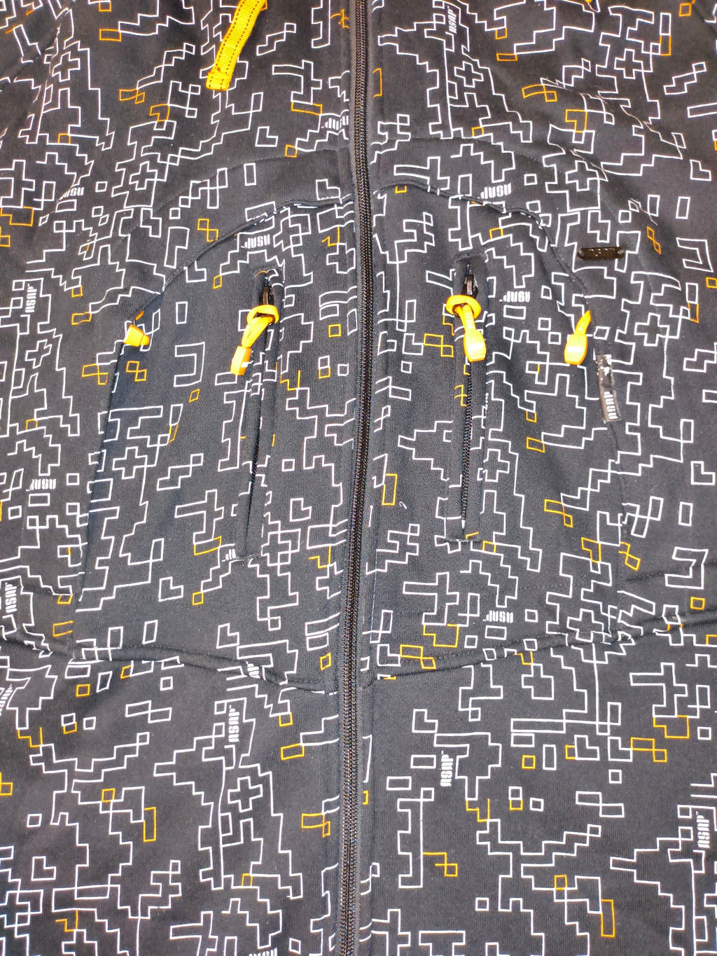 Awsum Thrift vintage Akademiks fleece jacket featuring a black, white, and yellow pixelated maze pattern with zip pockets