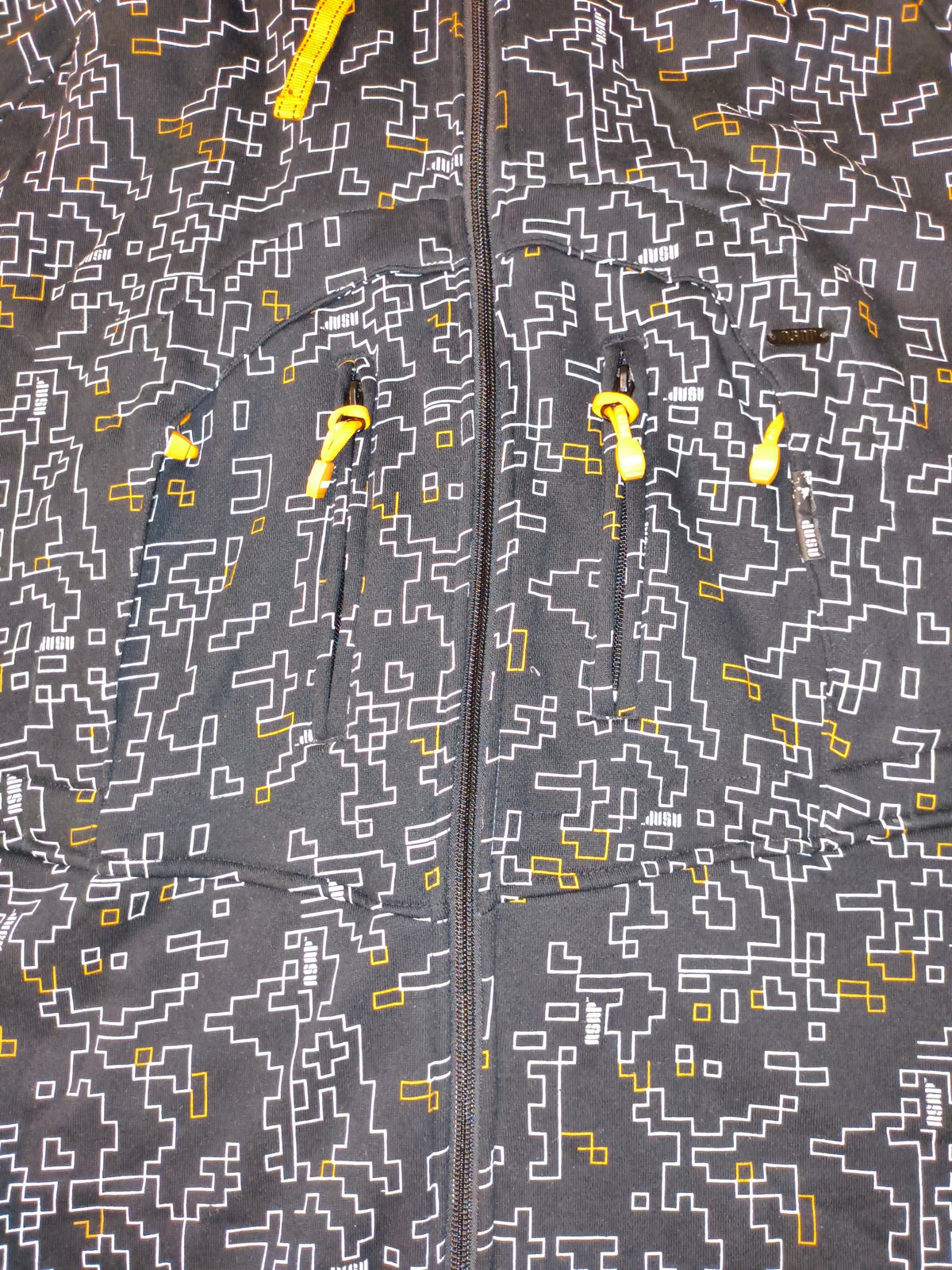 Awsum Thrift vintage Akademiks fleece jacket featuring a black, white, and yellow pixelated maze pattern with zip pockets
