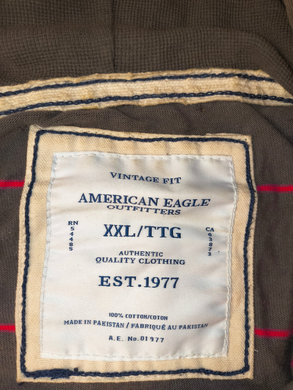 Awsum Thrift American Eagle Outfitters XXL hoodie interior brand label showing size and material details