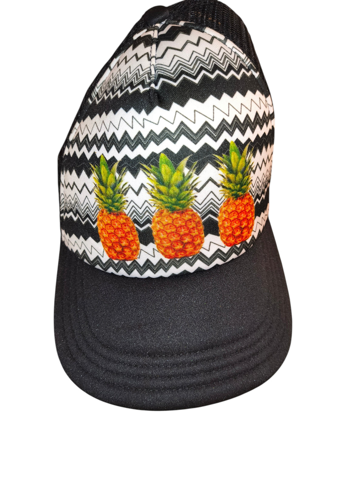 Awsum Thrift No Boundaries trucker hat with black and white chevron pattern and three pineapple graphics