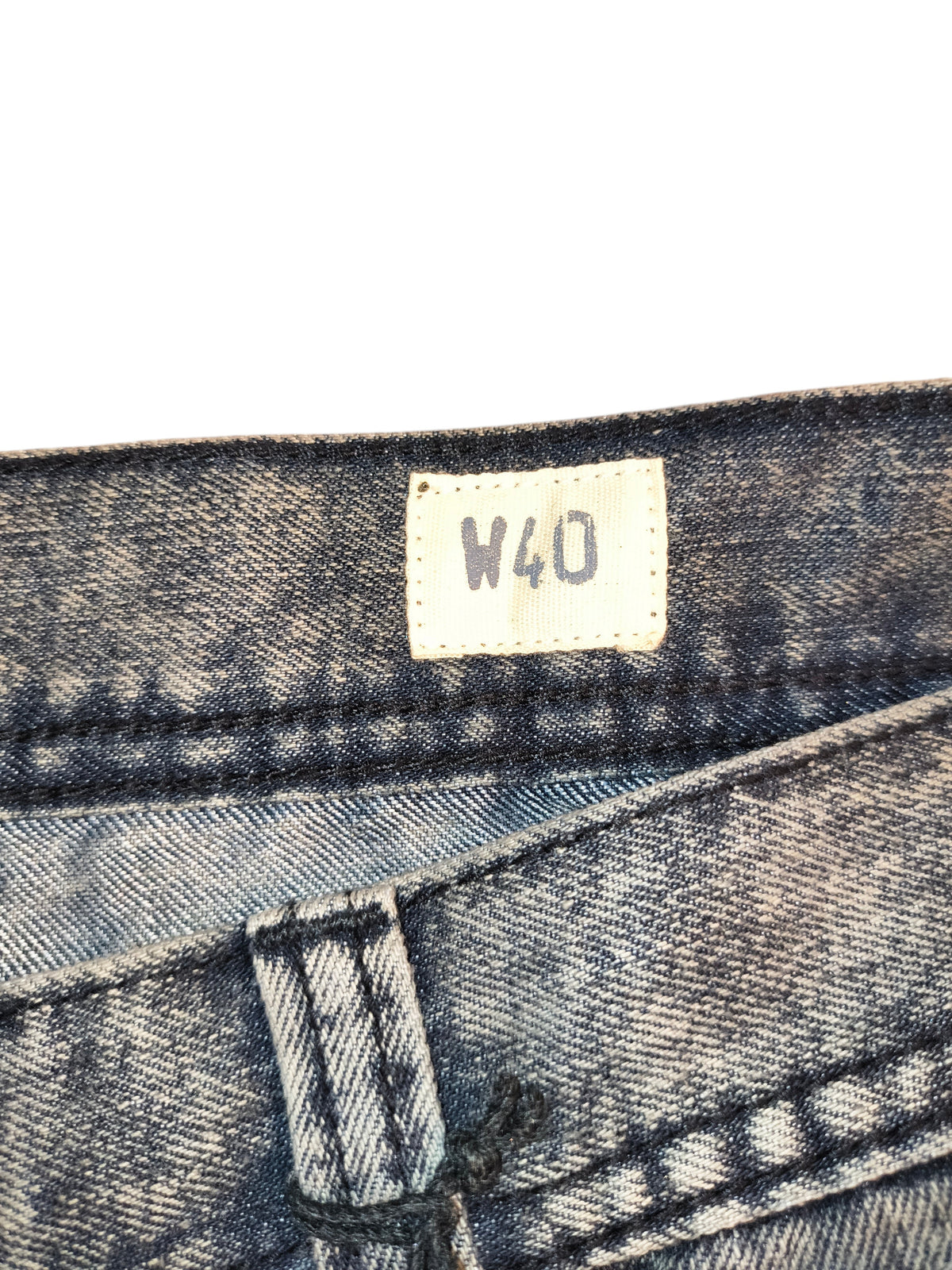 Awsum Thrift Decibel black stone washed denim shorts featuring a size 40 label on the waistband
