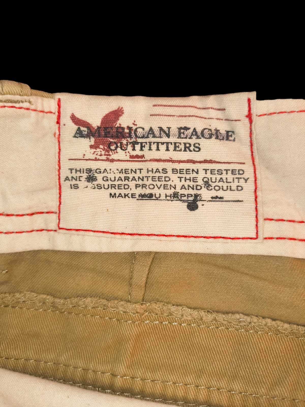 Awsum Thrift American Eagle Outfitters khaki cargo shorts interior label with red contrast stitching