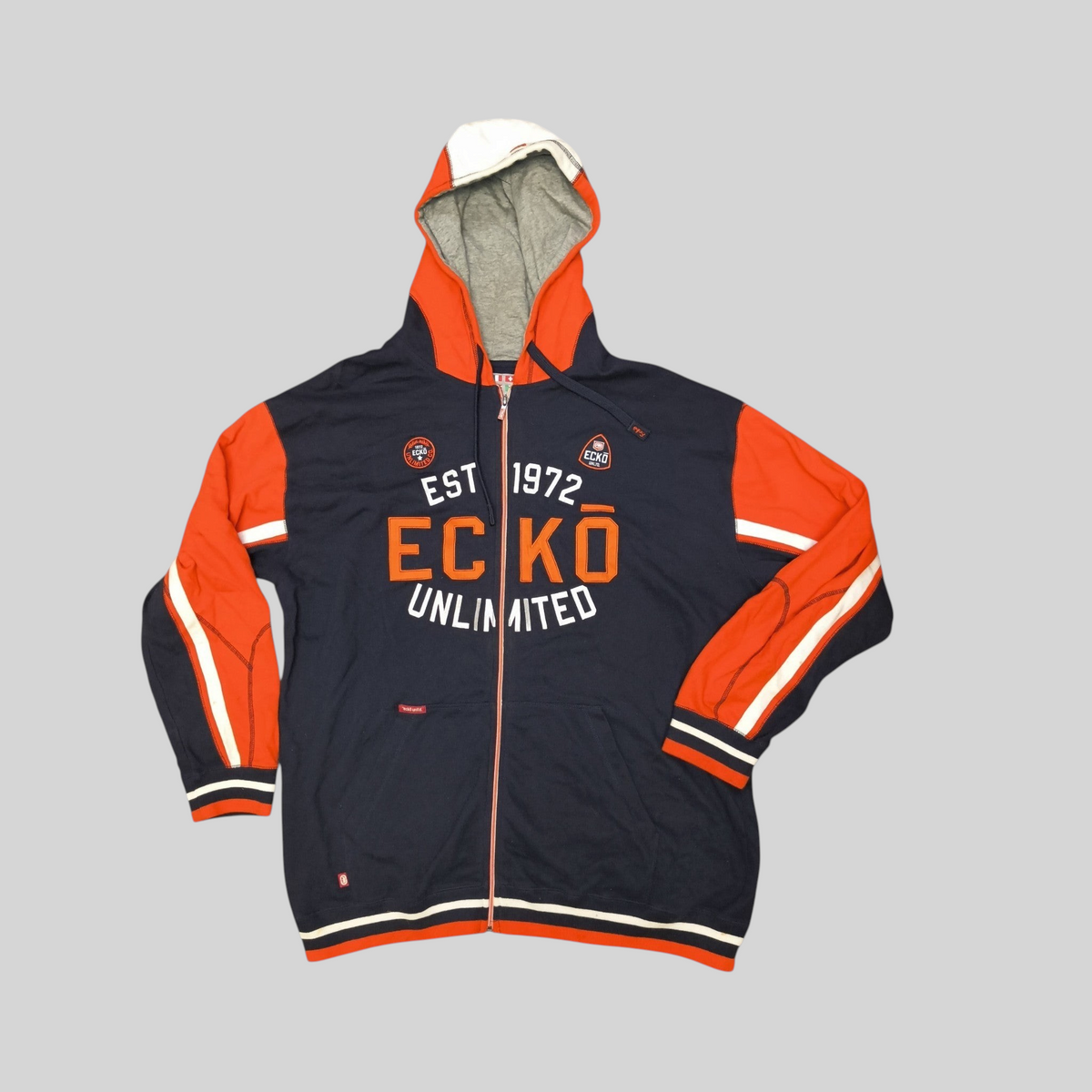 Awsum Thrift Ecko Unltd navy orange and white colorblock full-zip hoodie with EST 1972 graphic and logo patches