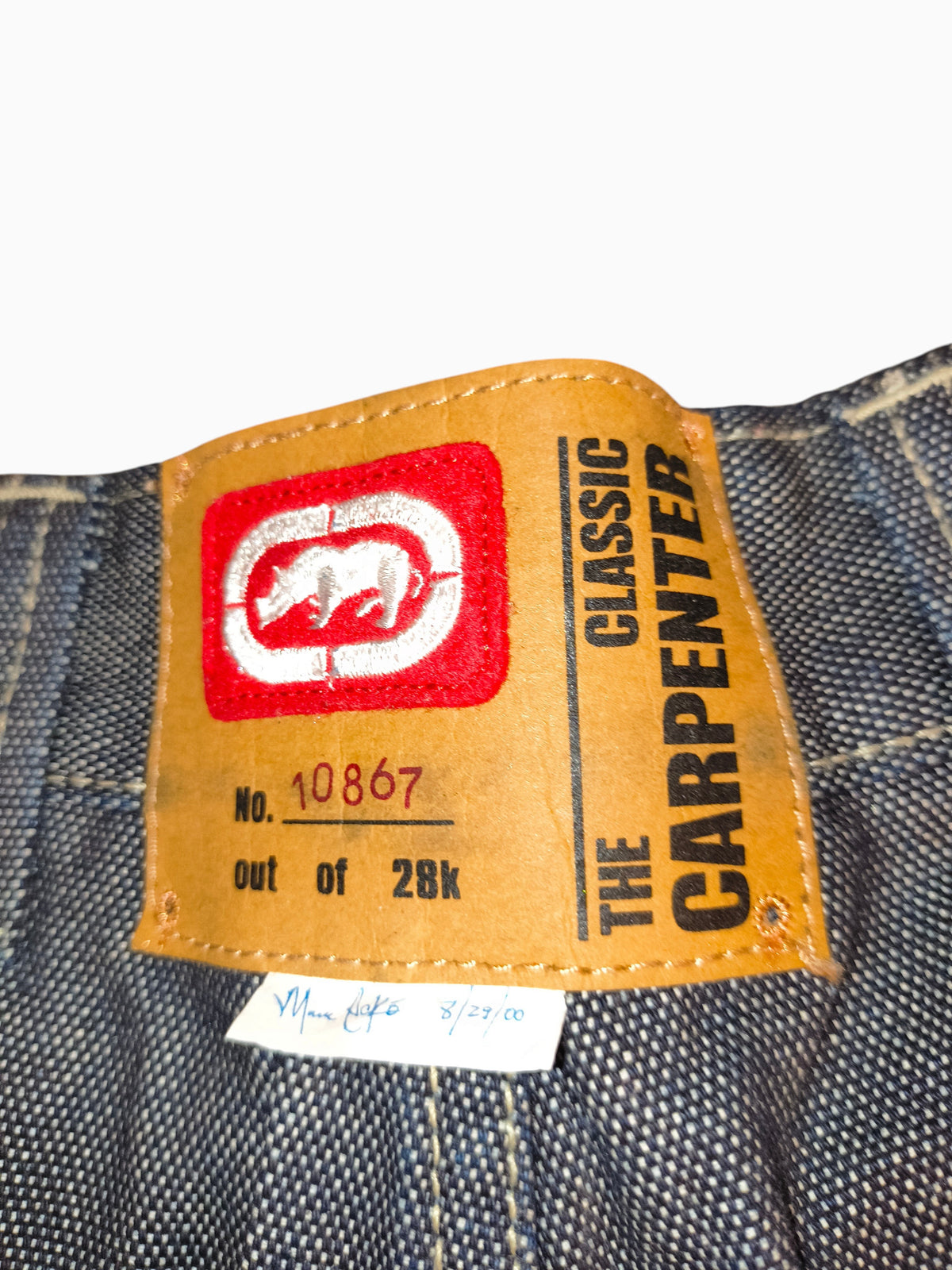 Awsum Thrift vintage Marc Ecko limited edition leather waist patch on dark indigo cross-hatch denim carpenter jeans
