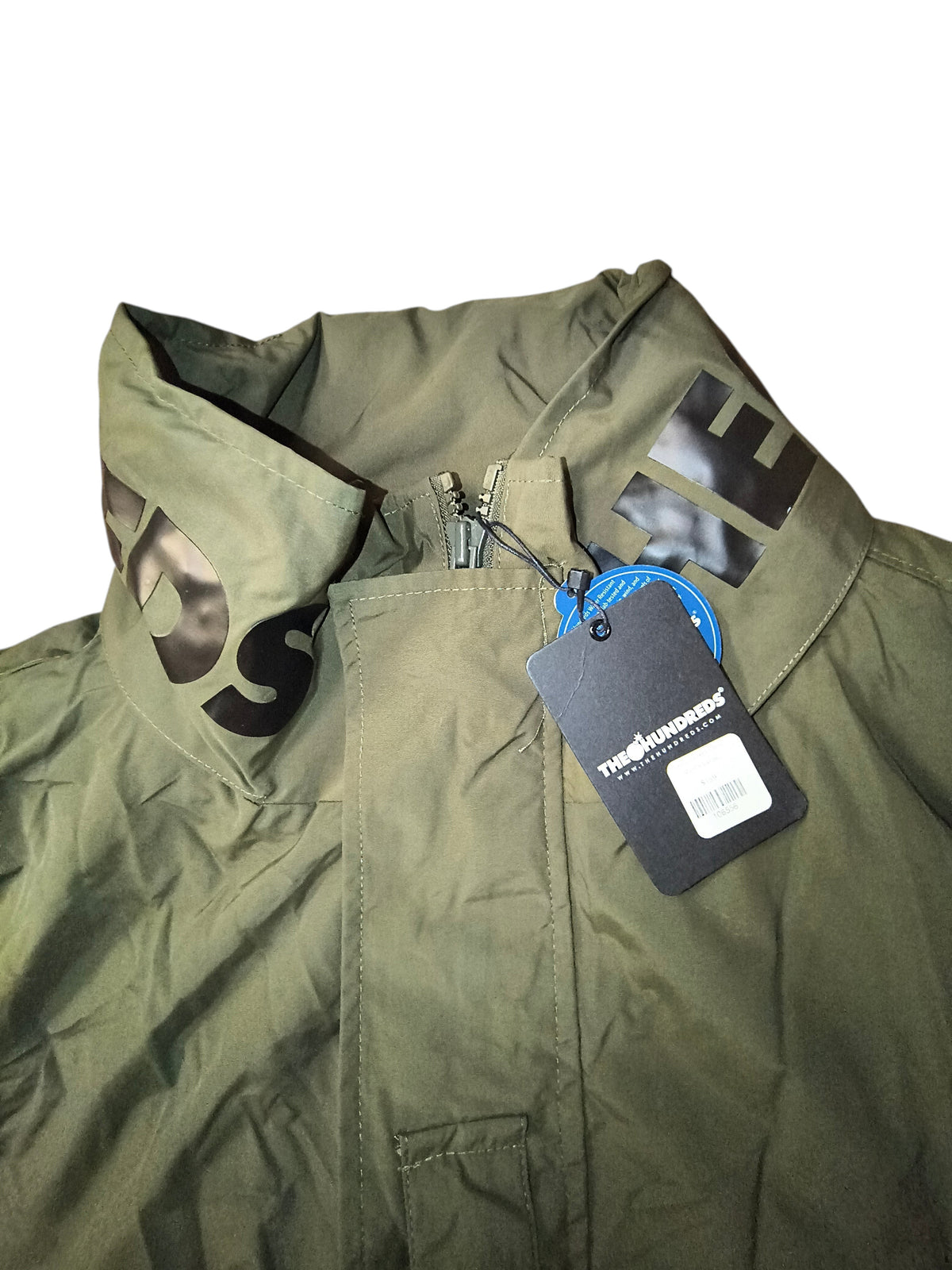 Awsum Thrift The Hundreds olive green water-resistant field jacket with black logo on high stand collar and tags