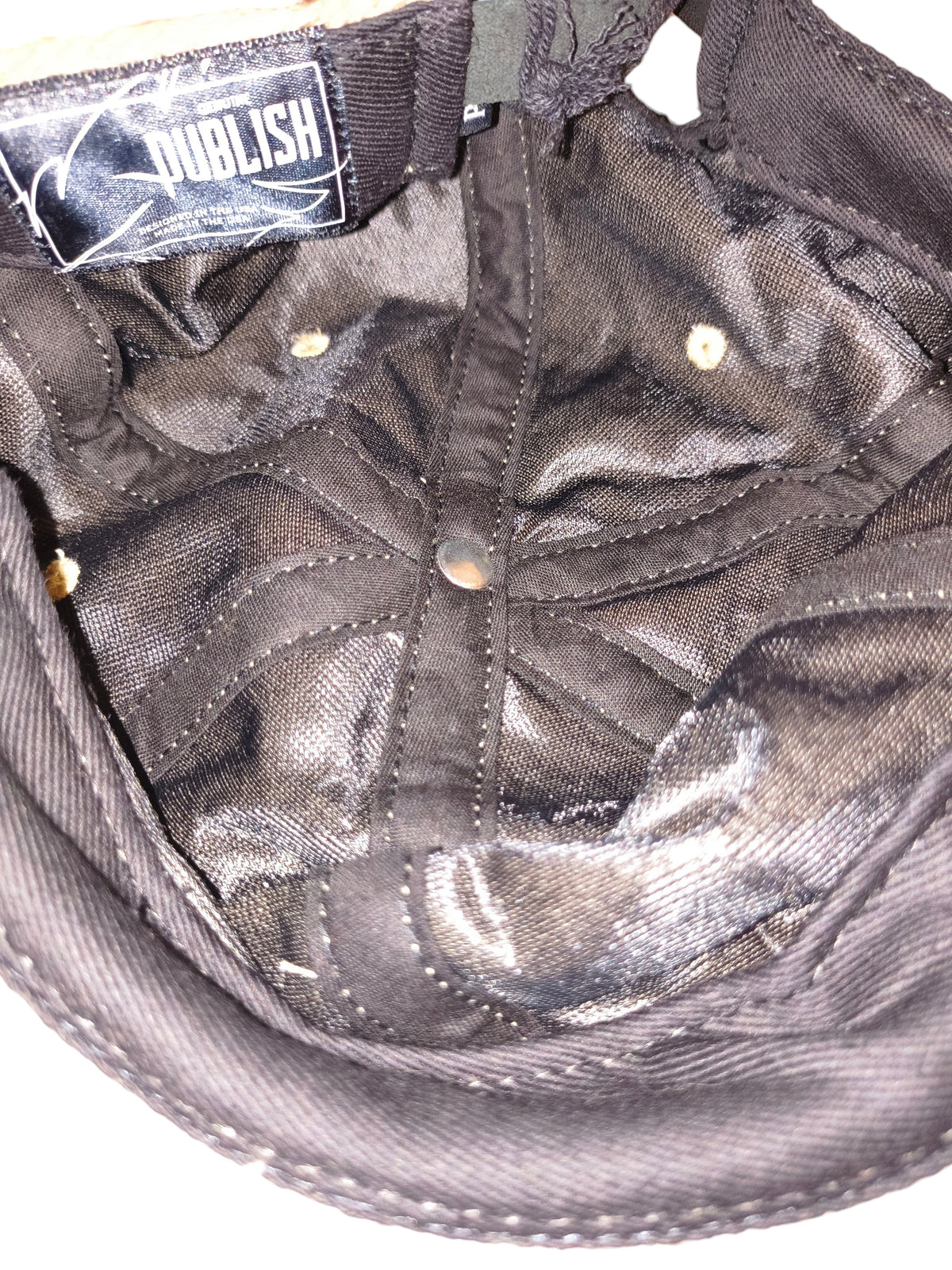 Awsum Thrift Publish Brand Davin 5-panel hat interior featuring black satin lining and branded woven label