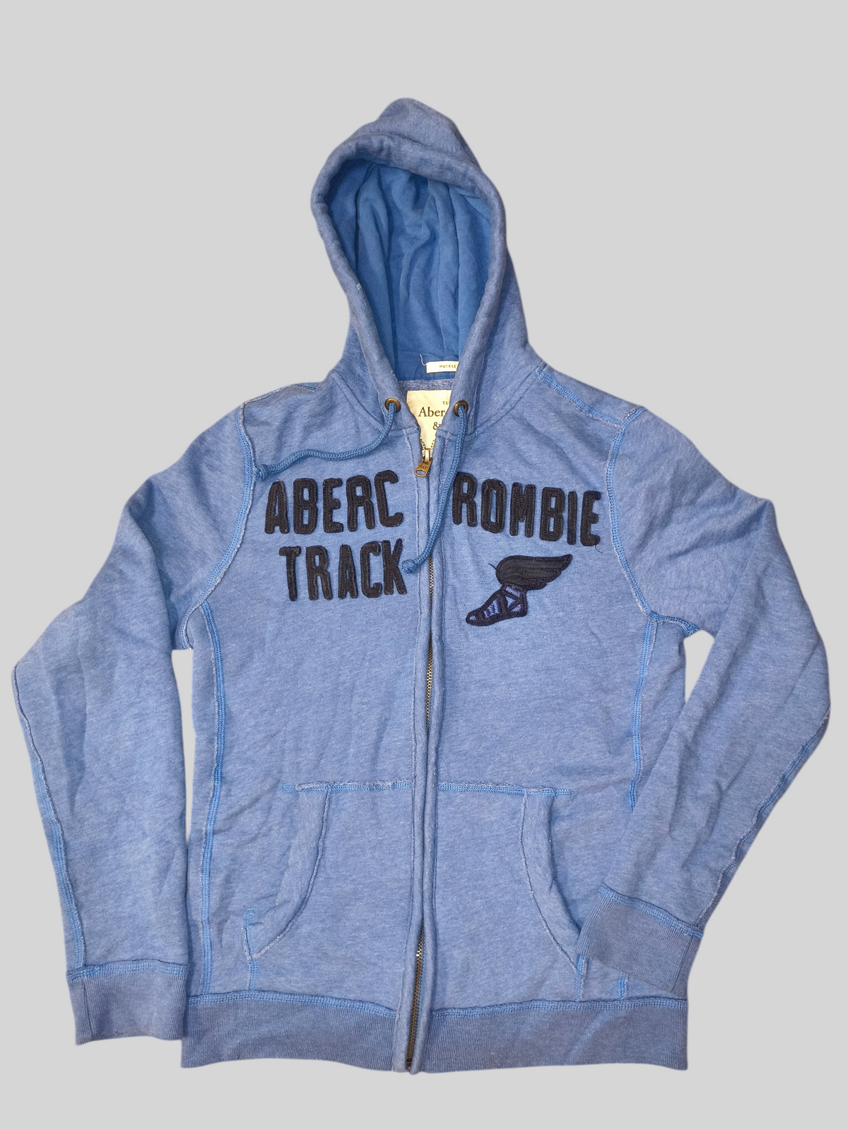 Awsum Thrift vintage Abercrombie & Fitch blue fleece full-zip hoodie with raw-edge track appliqué and winged shoe