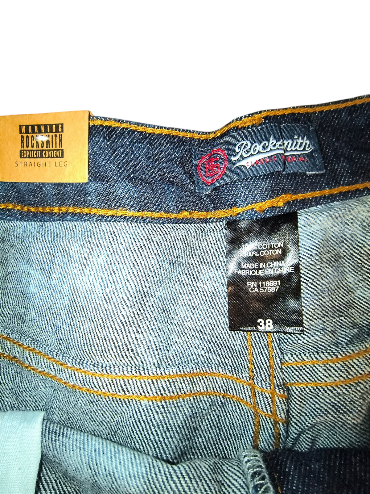 Awsum Thrift Rocksmith NYC jeans interior waist label with size 38 and classic material branding