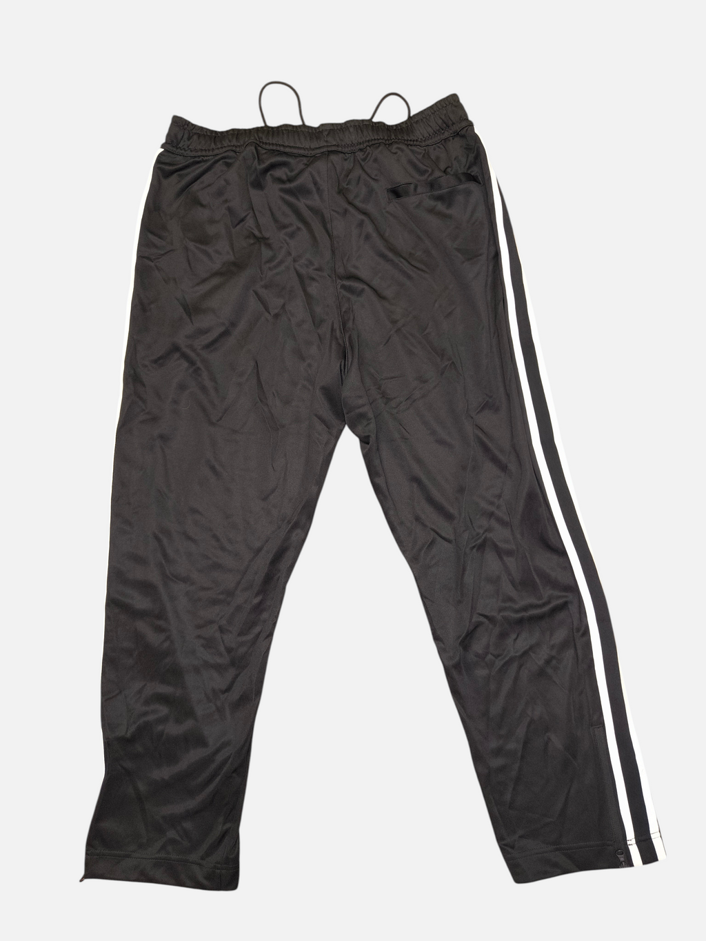 Awsum Thrift black Nike track pants with white side stripes and an elastic drawstring waistband