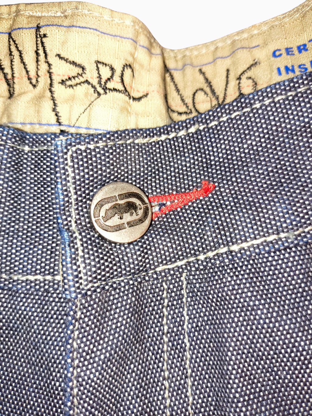 Awsum Thrift Marc Ecko vintage dark indigo cross-hatch denim jeans with branded rhino metal button and red stitching