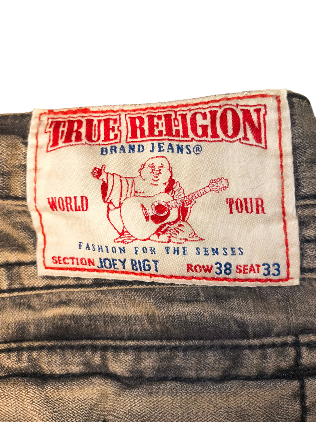 Awsum Thrift True Religion Joey Big T bell bottom jeans featuring the iconic Buddha logo patch on grey denim
