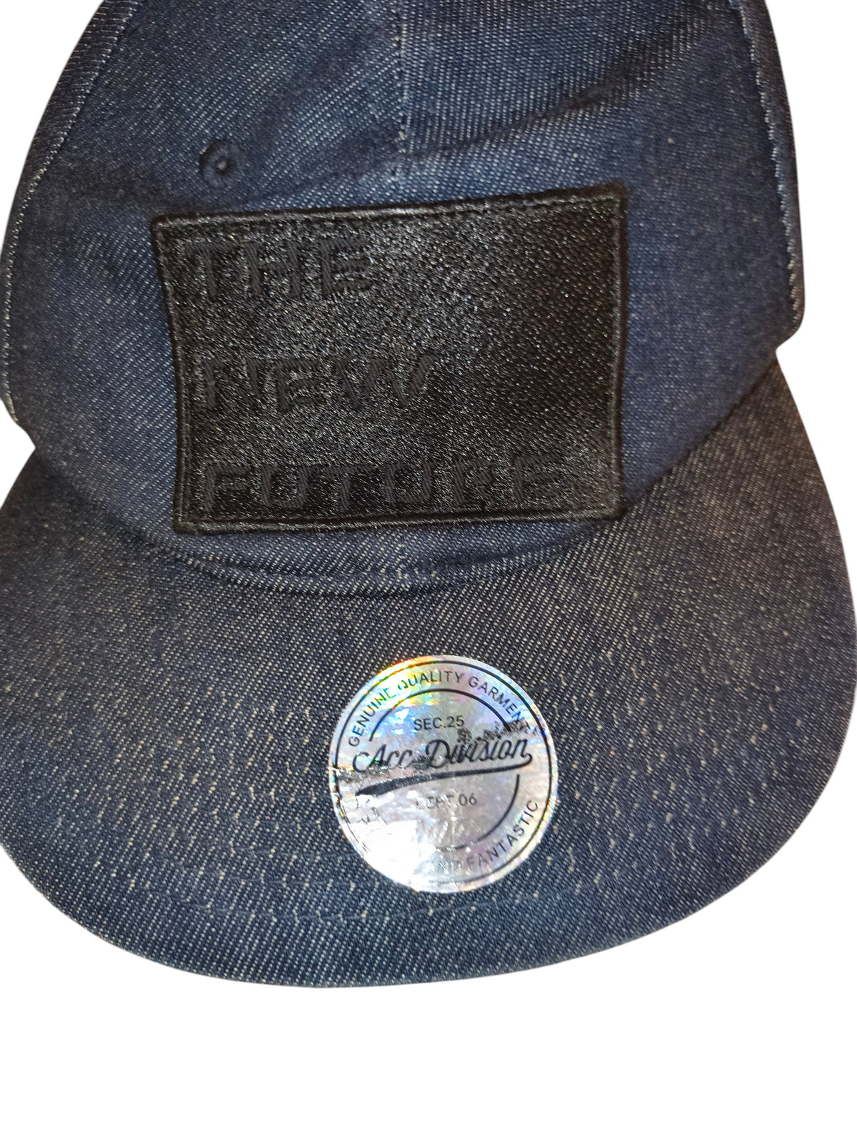 Awsum Thrift H&M blue denim snapback hat with a black The New Future patch and a circular holographic sticker